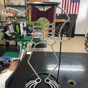 Skeleton candle holder